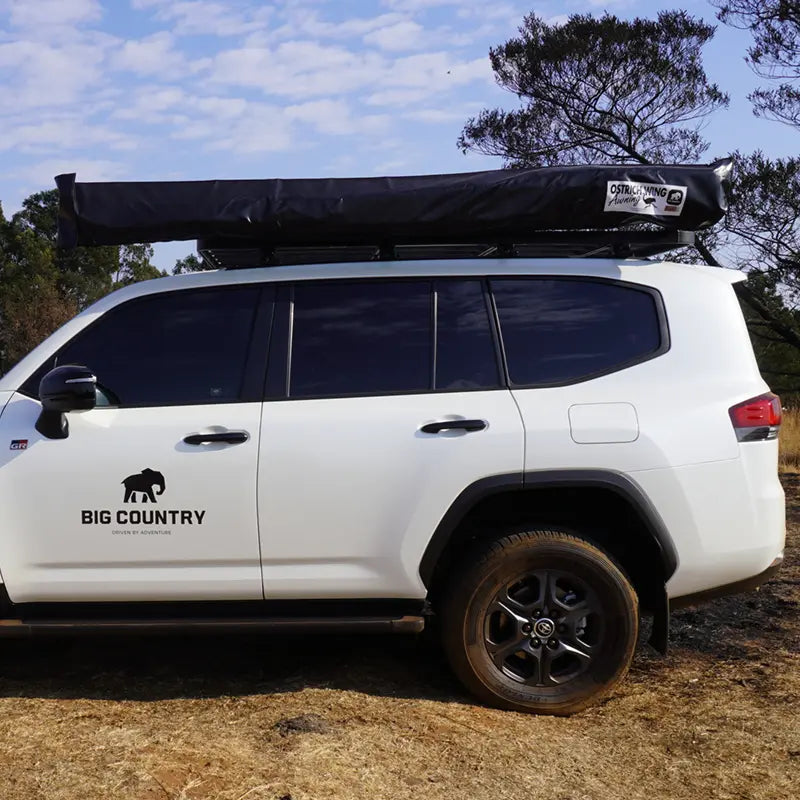 Ostrich Wing Awning - Mounting Side: Left / Canvas Colour: Grey / Bag Colour: Black